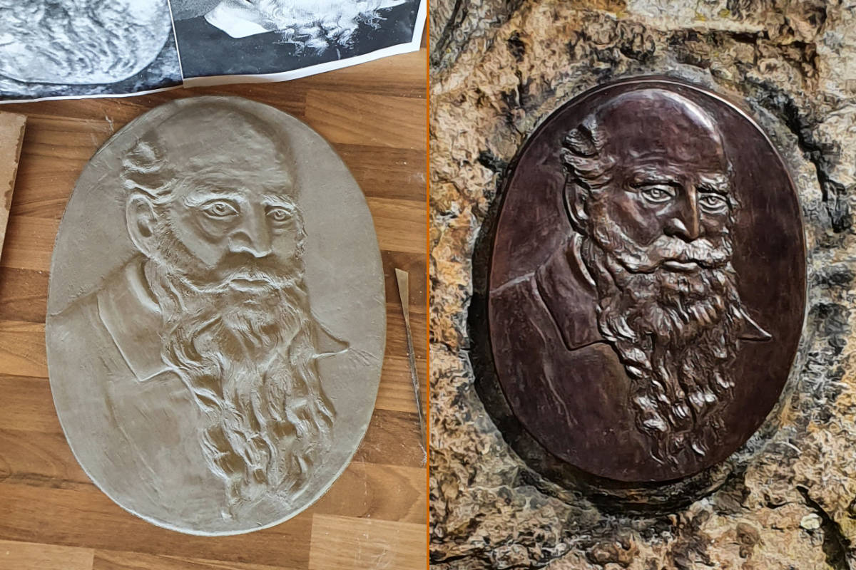 Bronzerelief mit dem Porträt einer Person.